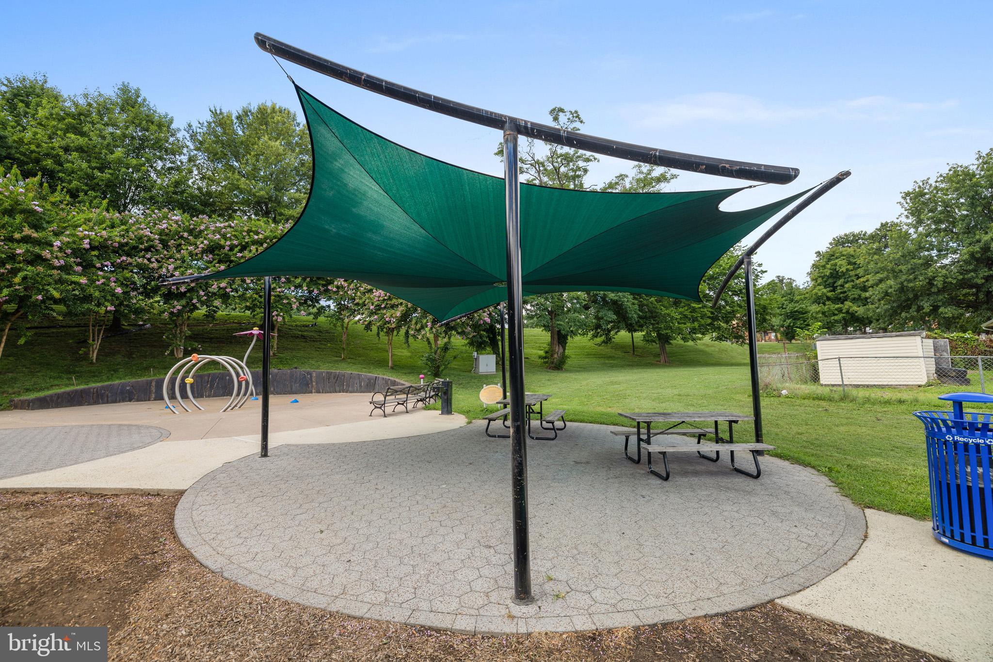 2823 24th Road South Arlington, VA 22206 - Photo 44 of 51 Shaded play area in a lush green park.