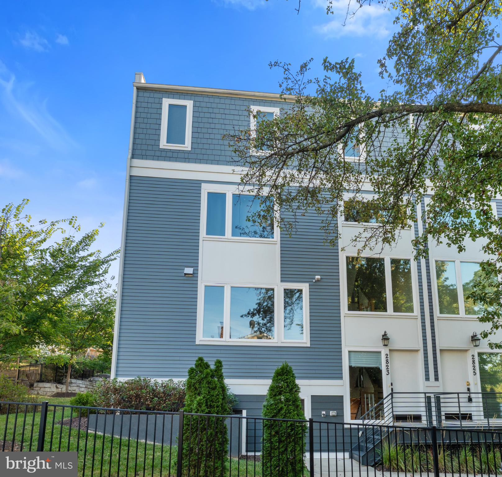 2823 24th Road South Arlington, VA 22206 - Photo 49 of 51 Modern townhouse with vibrant greenery.