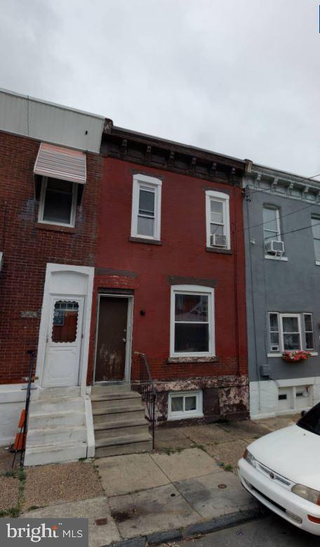 a building outdoor space with patio furniture