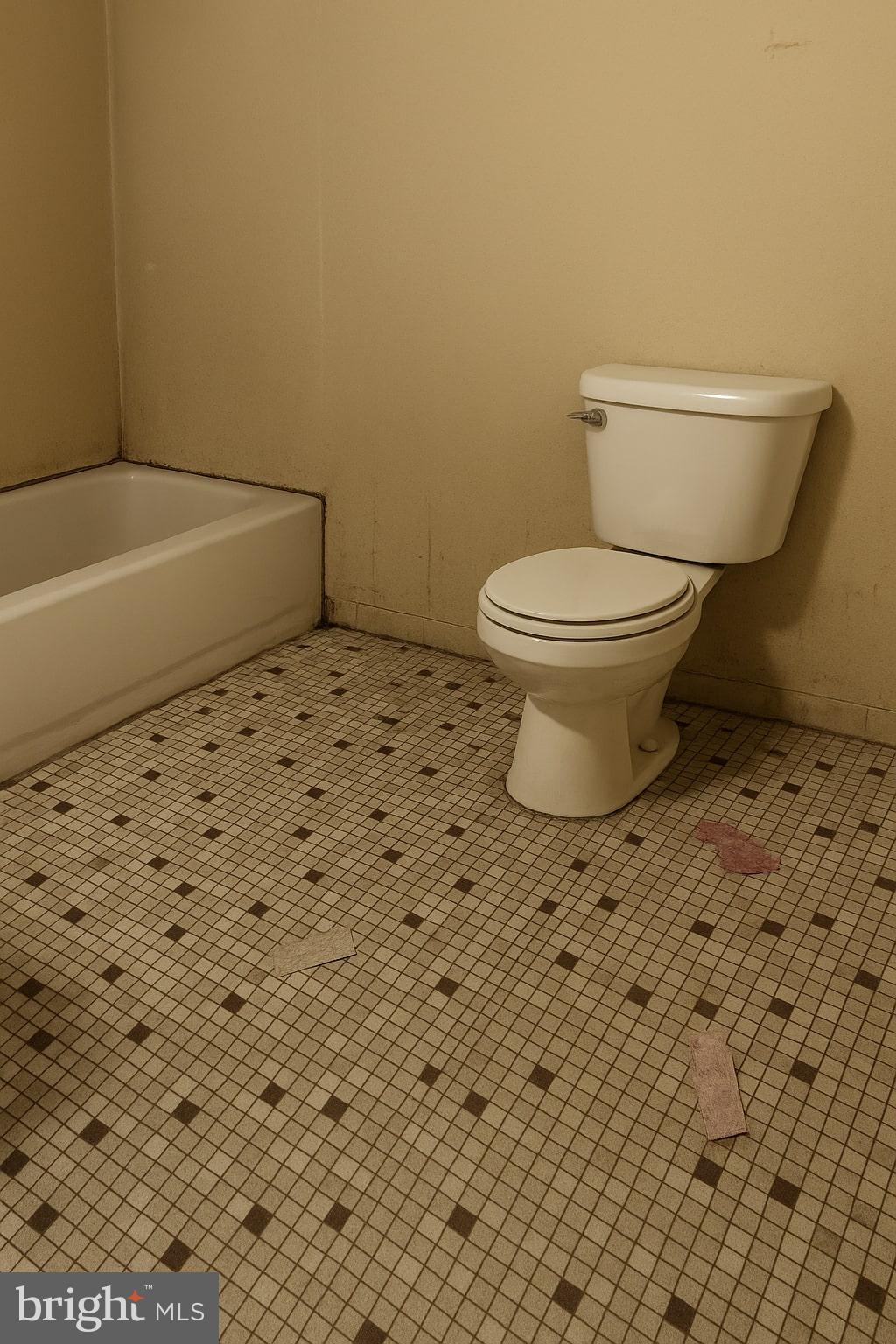 3557 North Marshall Street Philadelphia, PA 19140 - Photo 4 of 9 a bathroom with a toilet and a bathtub