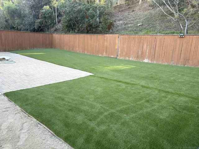 a view of a backyard with barn