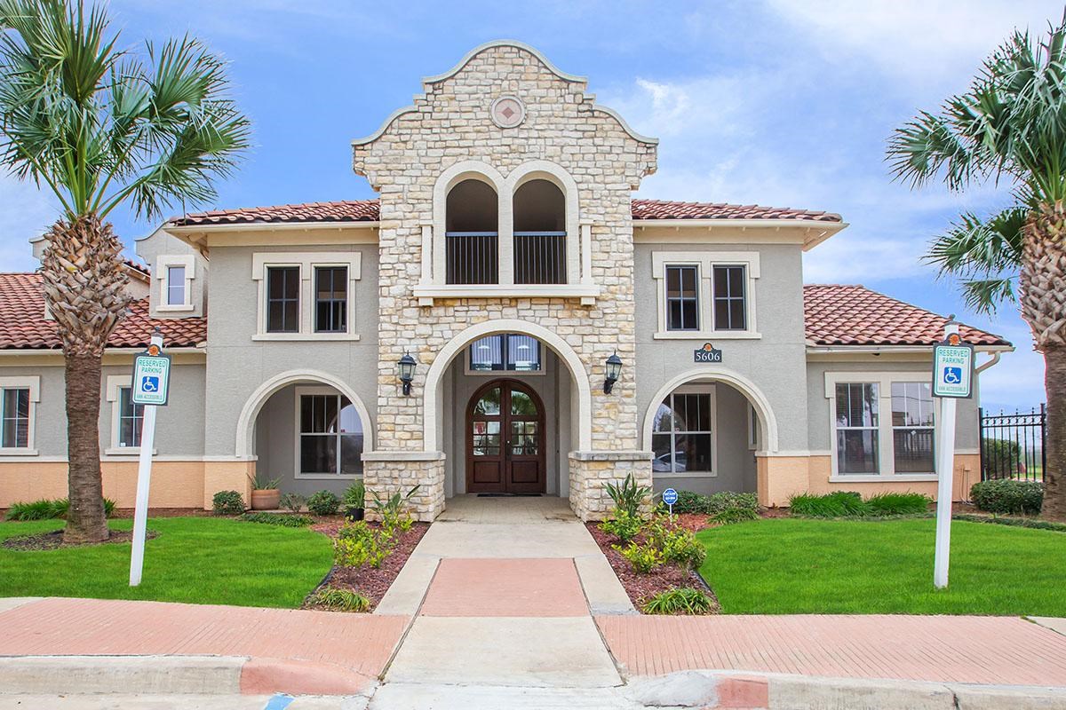 5606 St David Lane, Unit 160 Laredo, TX 78046 - Photo 2 of 6 a view of a white house with a yard and plants