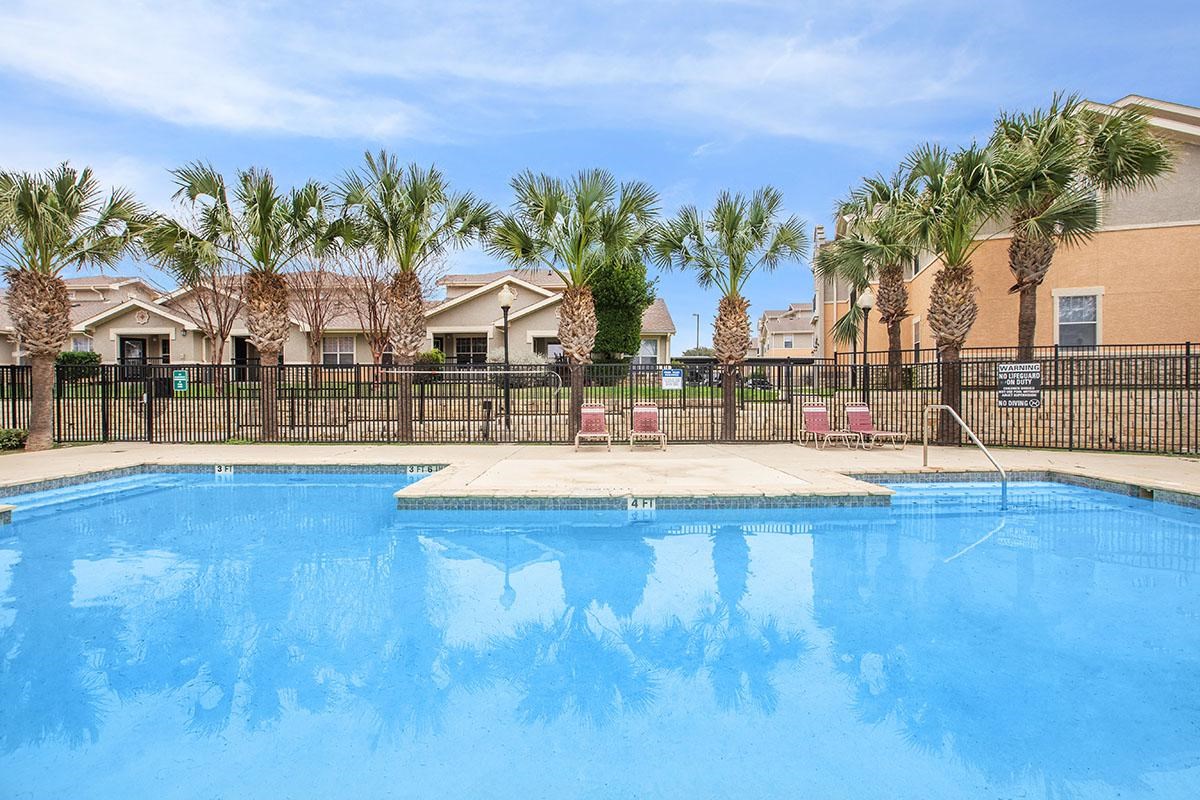 5606 St David Lane, Unit 160 Laredo, TX 78046 - Photo 3 of 6 a view of swimming pool with outdoor seating and deck in the back