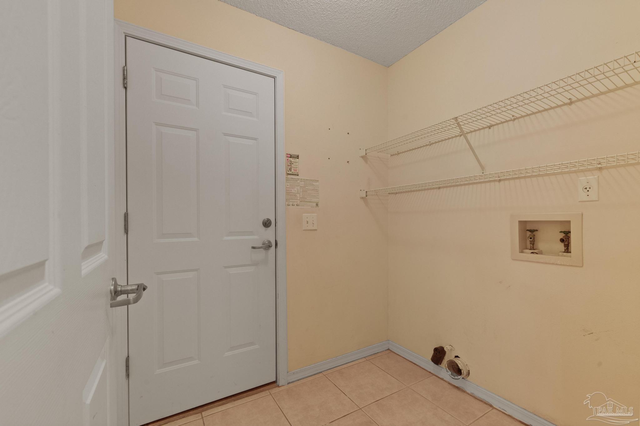 1342 Sunrunner Road Pensacola, FL 32504 - Photo 23 of 34 leads to one car garage