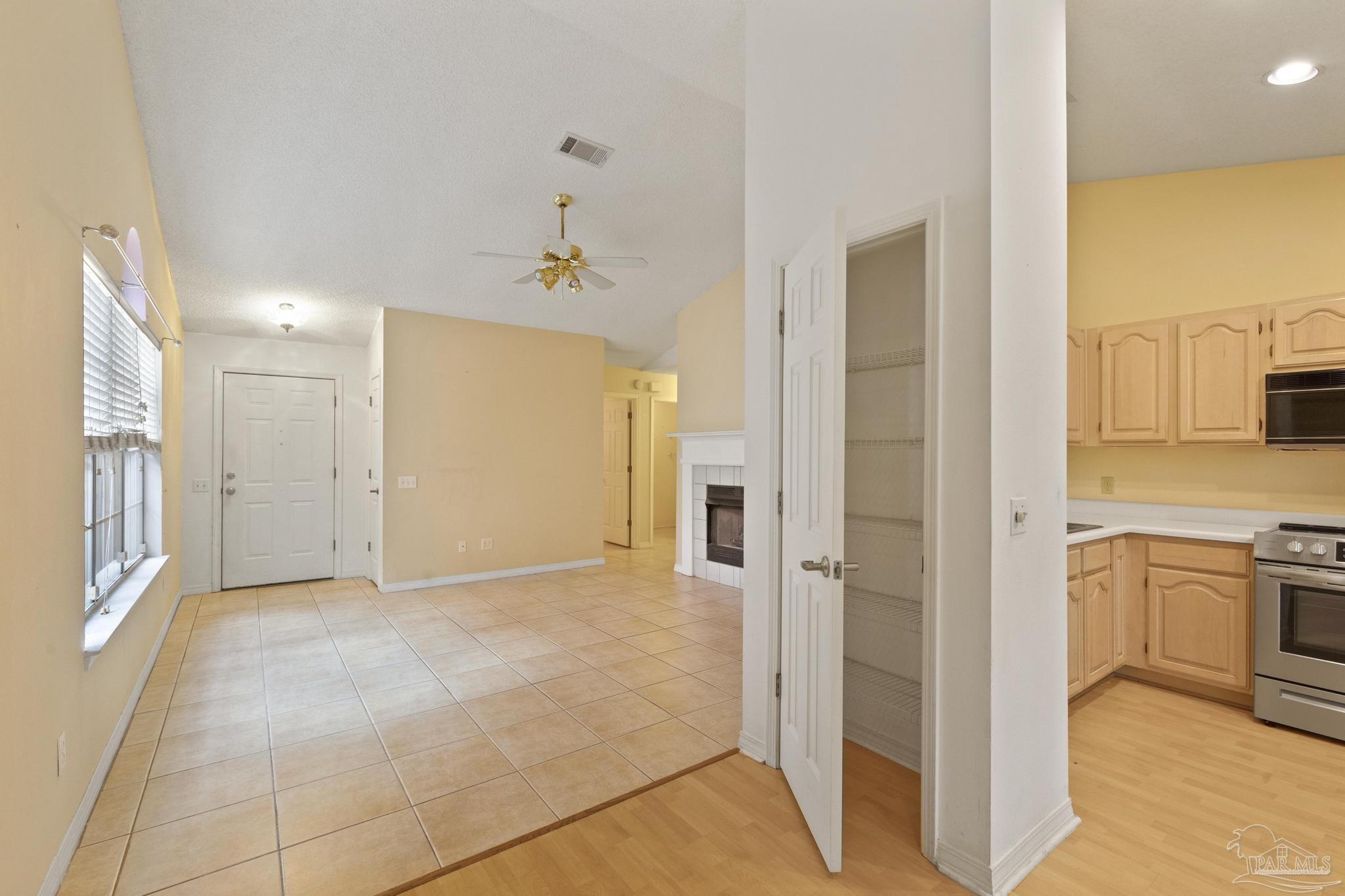 1342 Sunrunner Road Pensacola, FL 32504 - Photo 10 of 34 looking from eat in area back toward front door