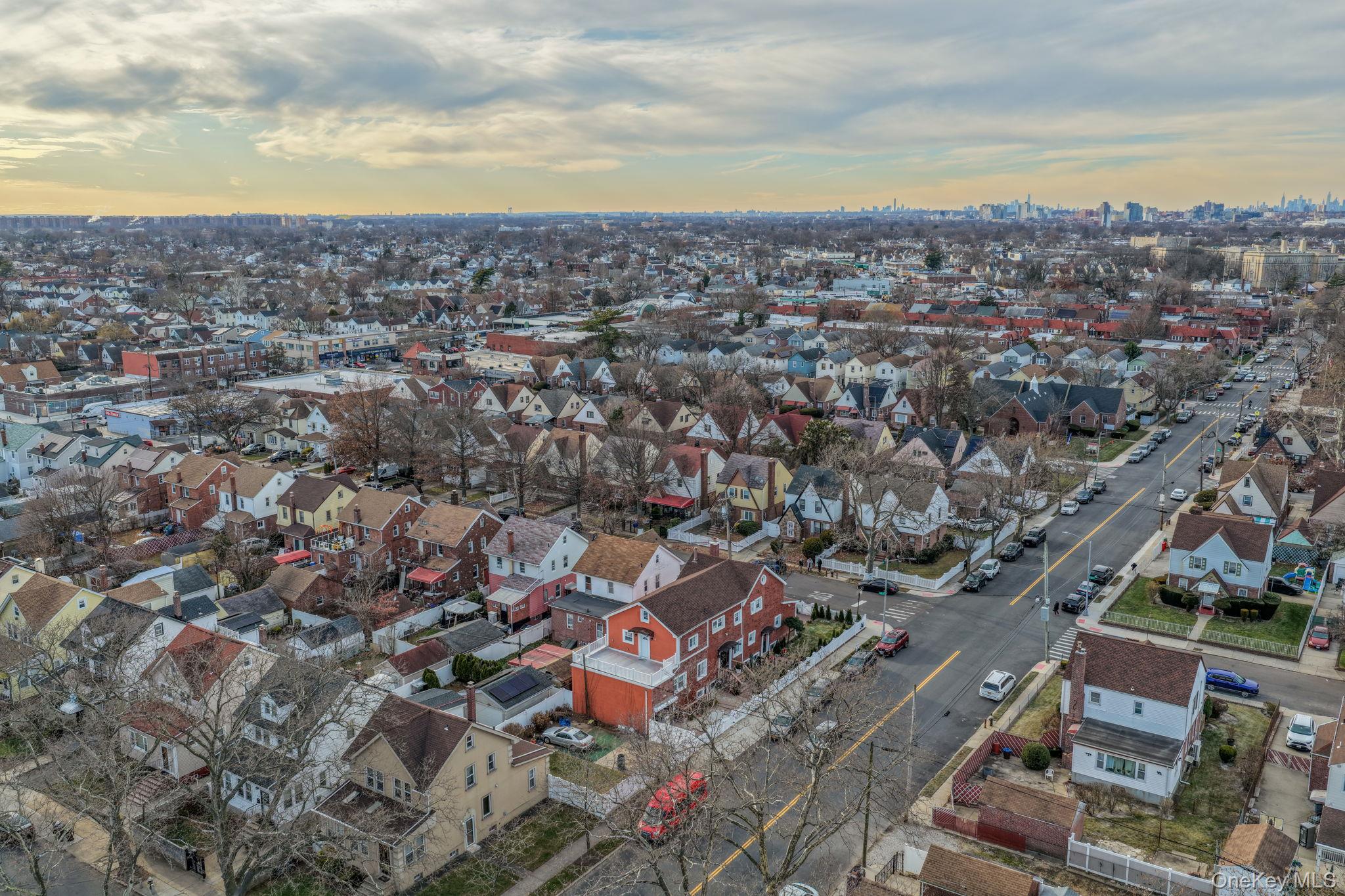 116-01 221st Street Queens, NY 11411 - Photo 3 of 19 Aerial view of property's location with nearby urban area and nearby suburban area