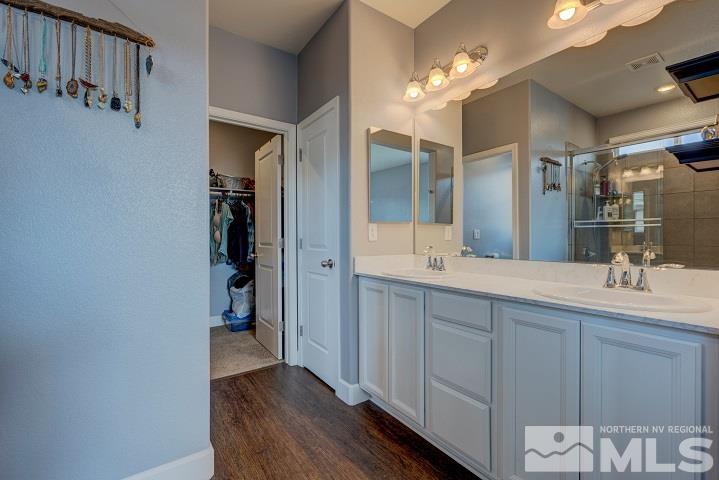 9405 Cape Drive Reno, NV 89506 - Photo 12 of 17 a bathroom with a sink and a mirror
