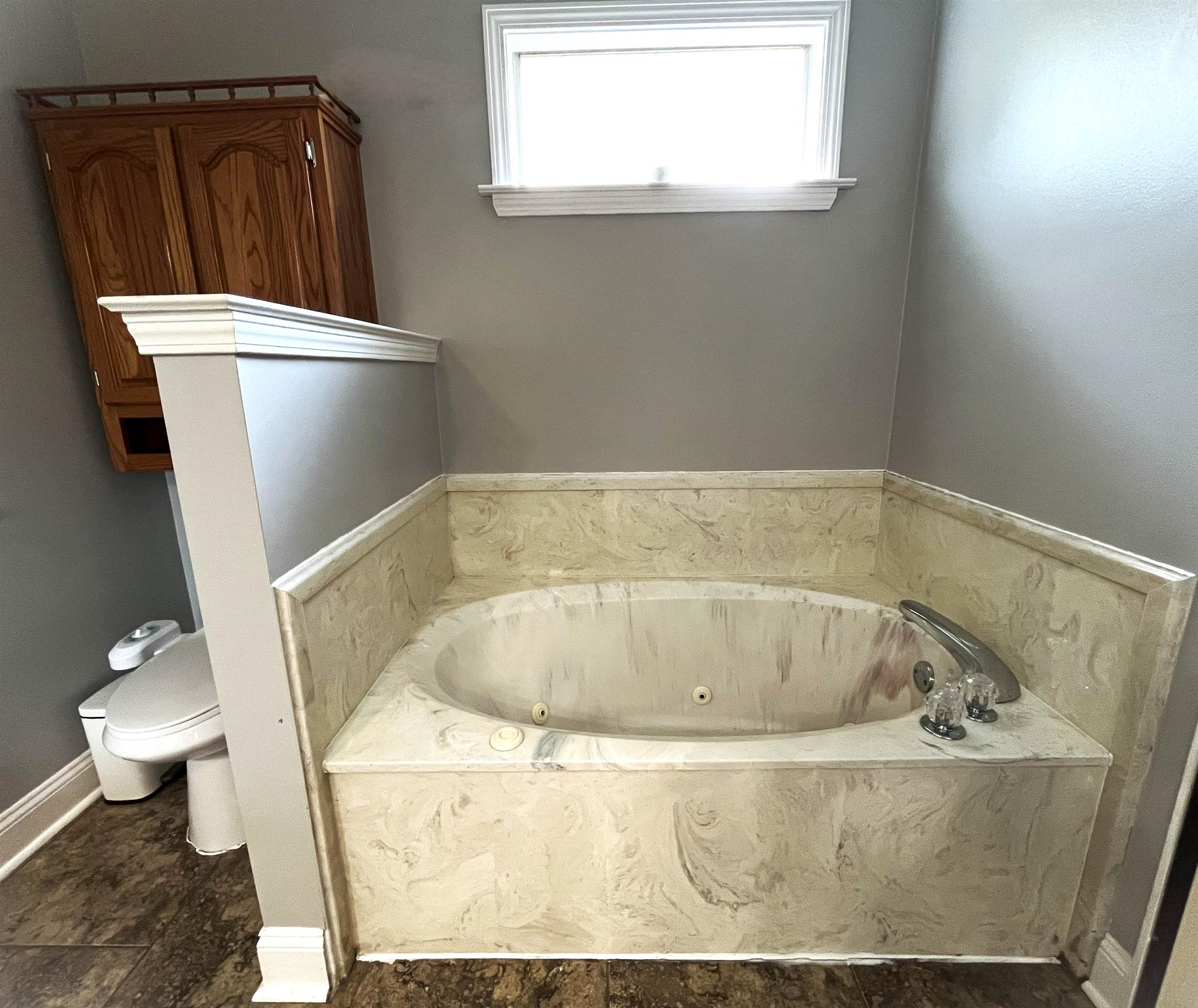 4020 Meade Lake Road Millington, TN 38053 - Photo 2 of 23 Bathroom with toilet and a bath