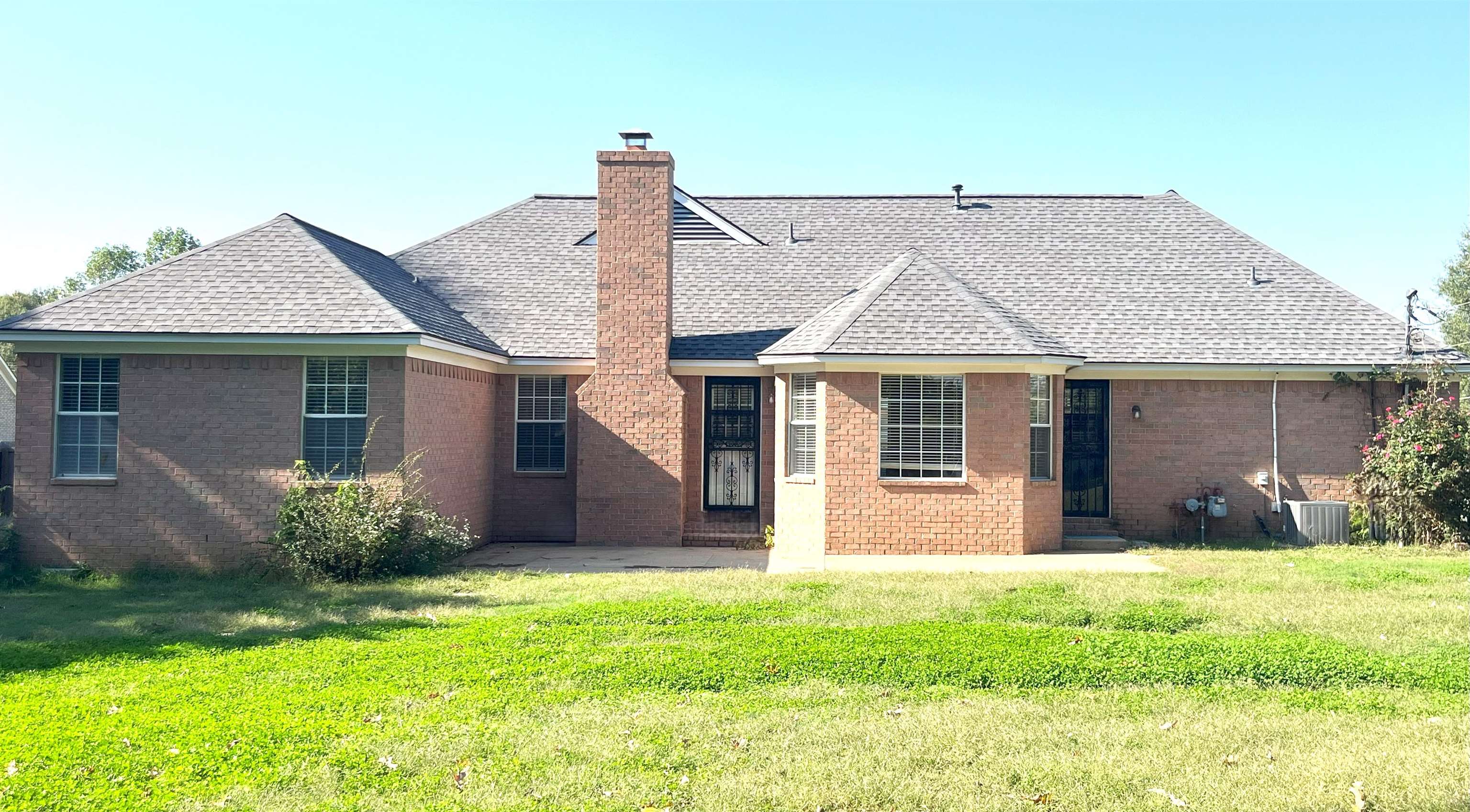 4020 Meade Lake Road Millington, TN 38053 - Photo 4 of 23 Rear view of property with a lawn and central air condition unit