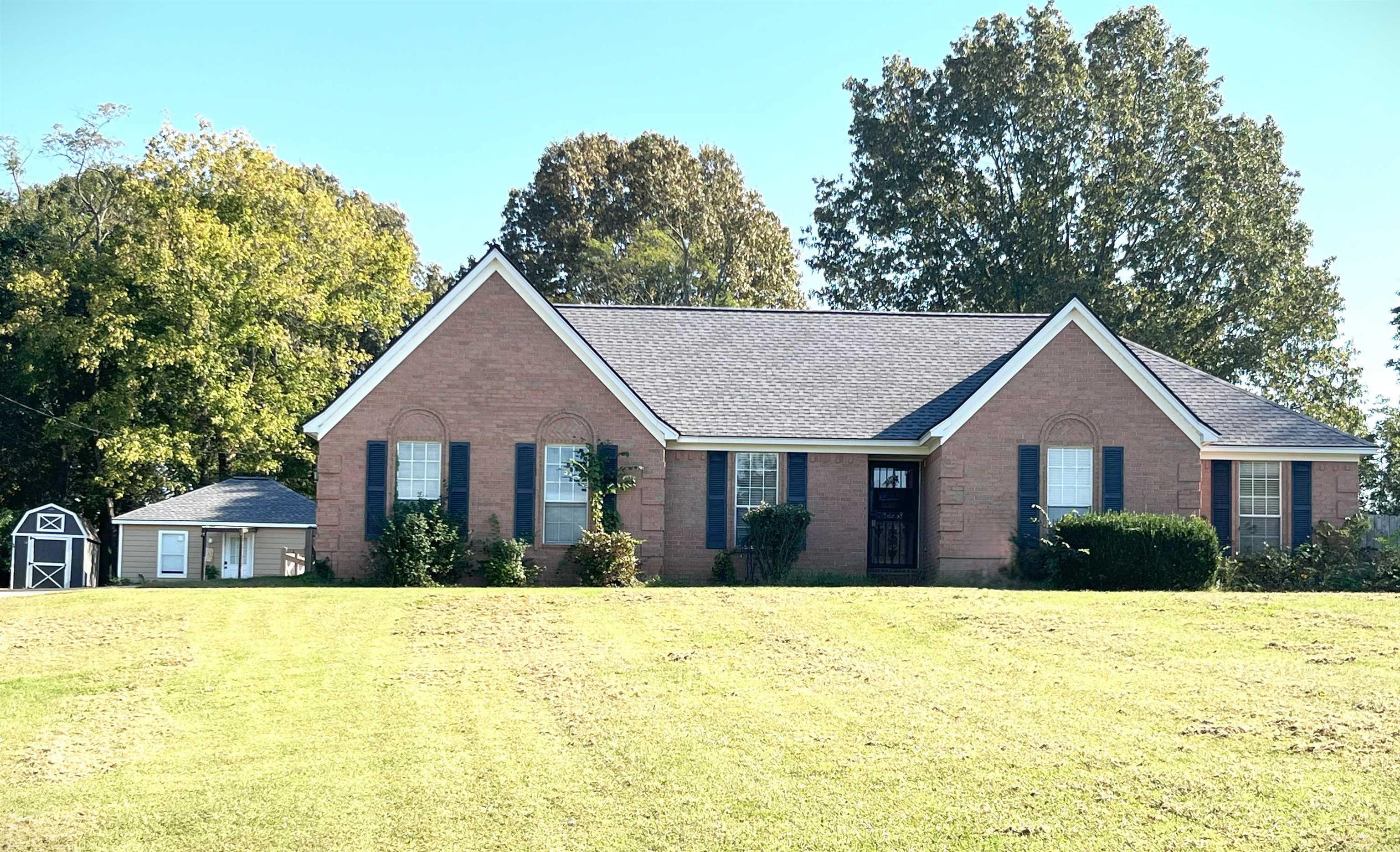 4020 Meade Lake Road Millington, TN 38053 - Photo 8 of 23 Ranch-style home with a front yard and a storage unit