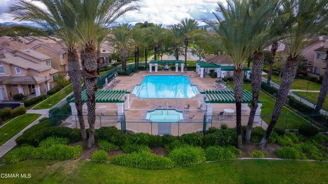 a view of a house with a street