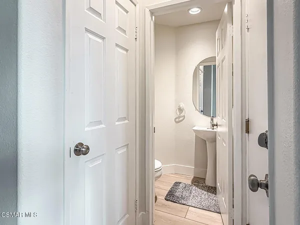 a bathroom with a granite countertop shower
