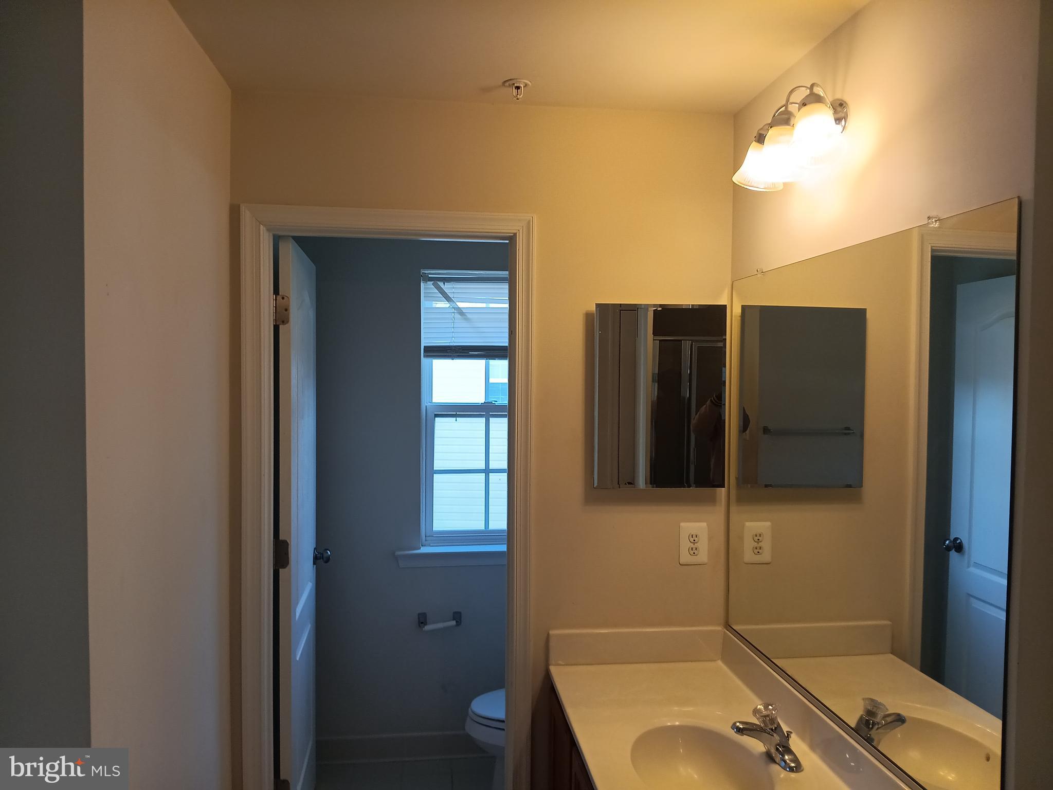 9707 Risen Star Drive Upper Marlboro, MD 20772 - Photo 31 of 35 a bathroom with a tub and a sink