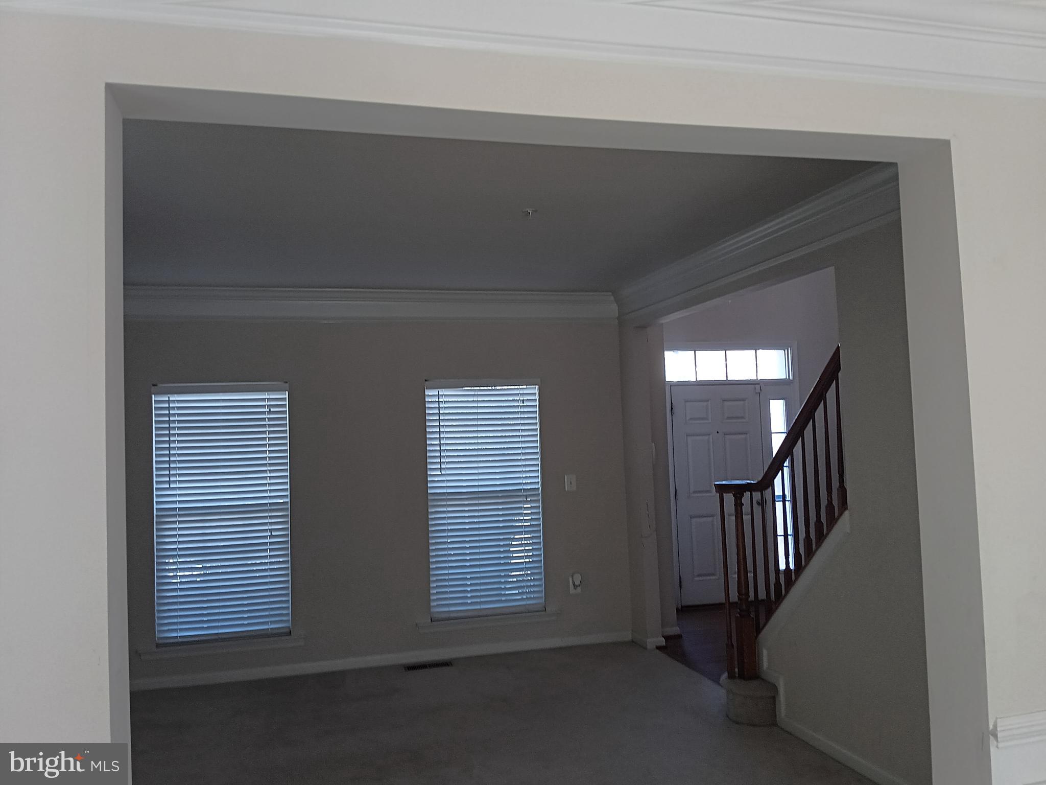 9707 Risen Star Drive Upper Marlboro, MD 20772 - Photo 10 of 35 a view of entryway with stairs