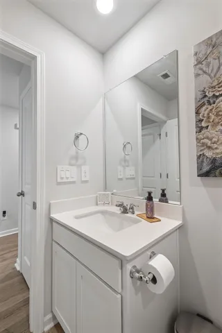 a view of bathroom with dual sinks