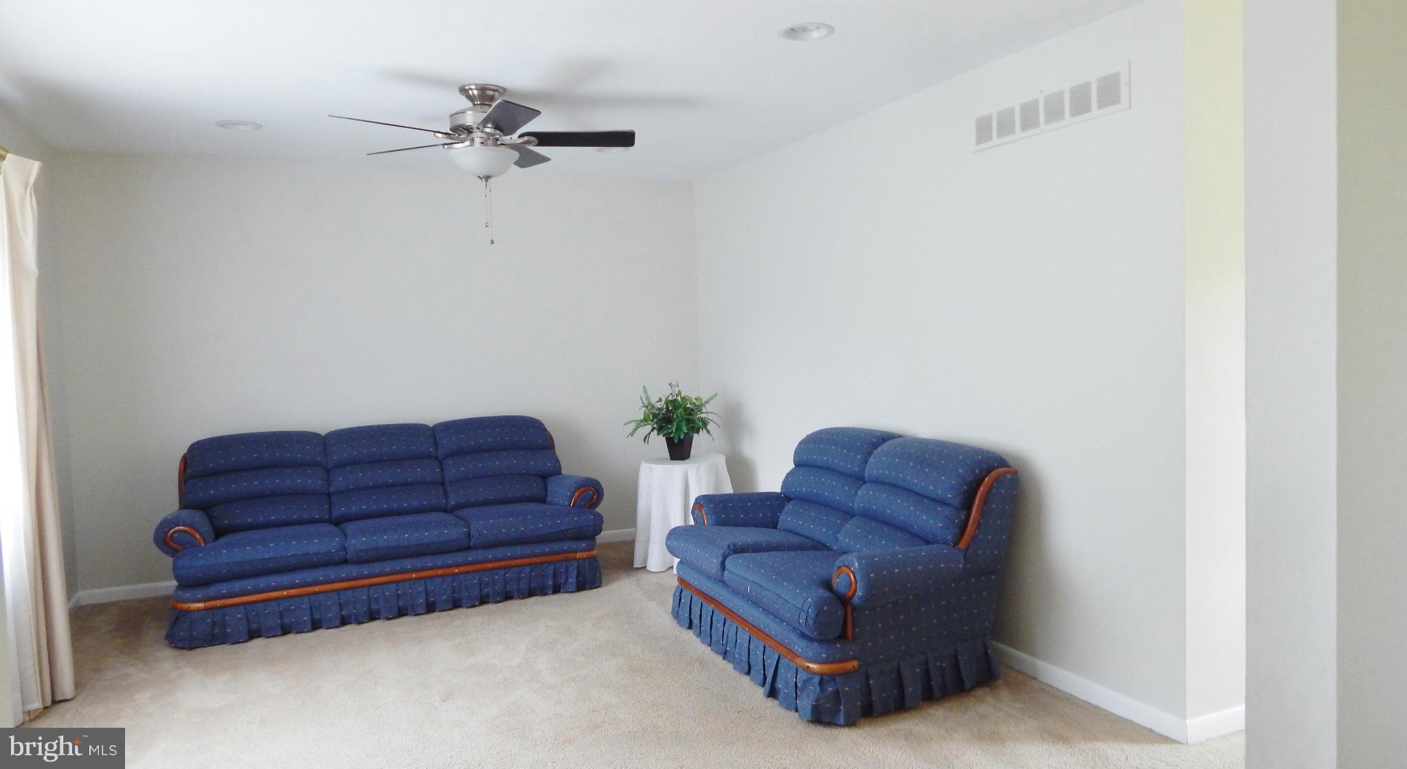785 Evergreen Road Severn, MD 21144 - Photo 11 of 25 a living room with furniture