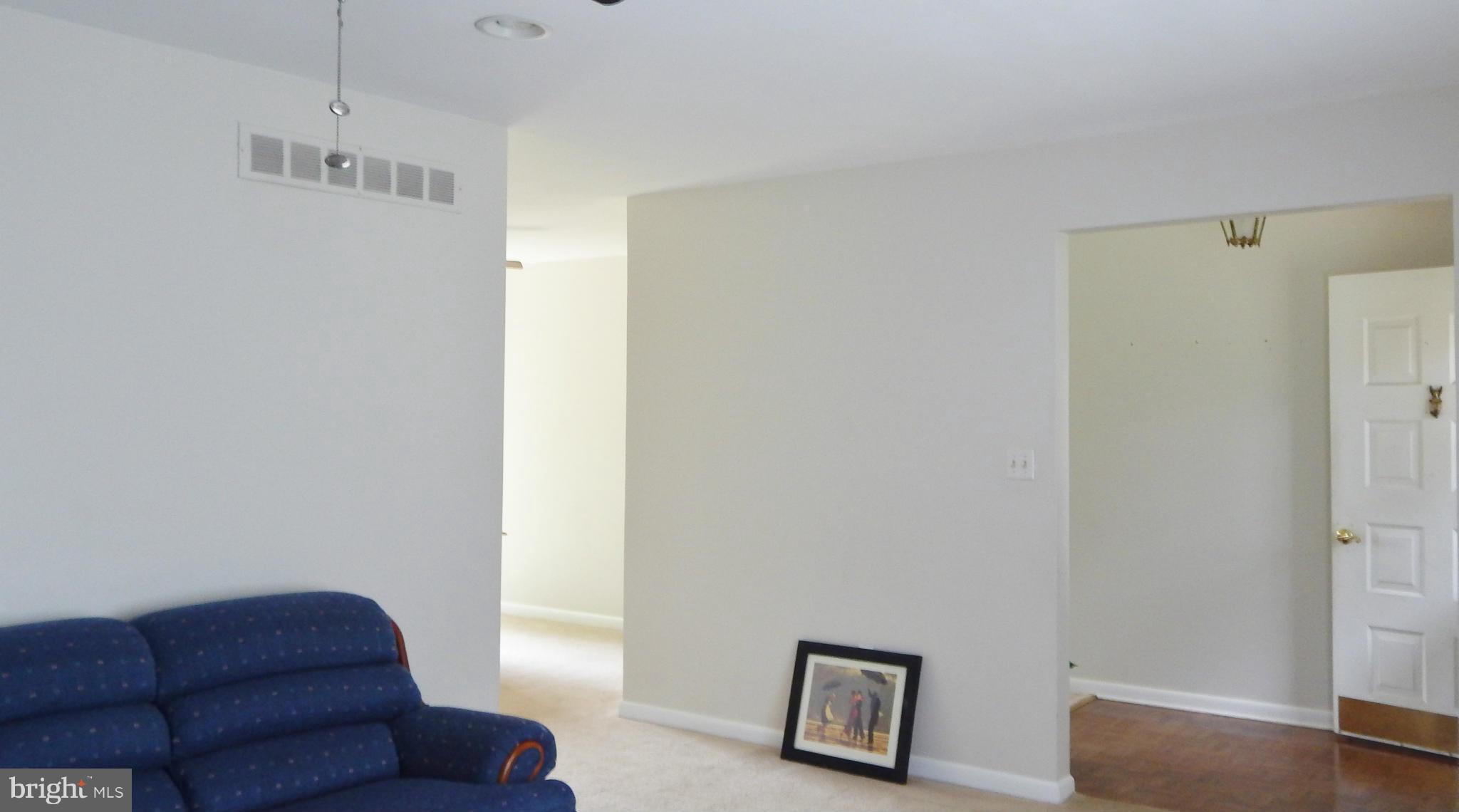 785 Evergreen Road Severn, MD 21144 - Photo 12 of 25 a living room with furniture and a window