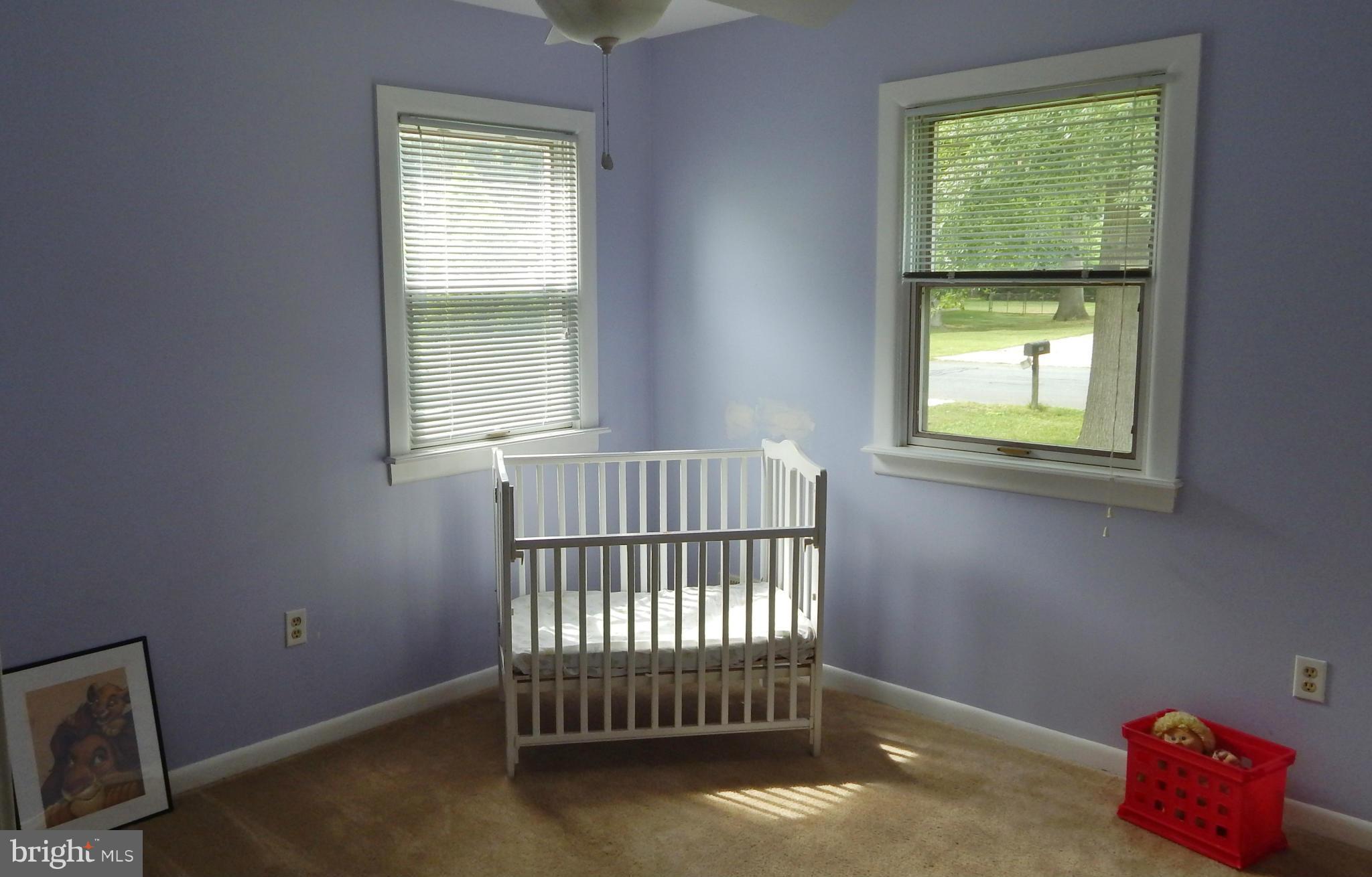 785 Evergreen Road Severn, MD 21144 - Photo 21 of 25 an empty room with a window