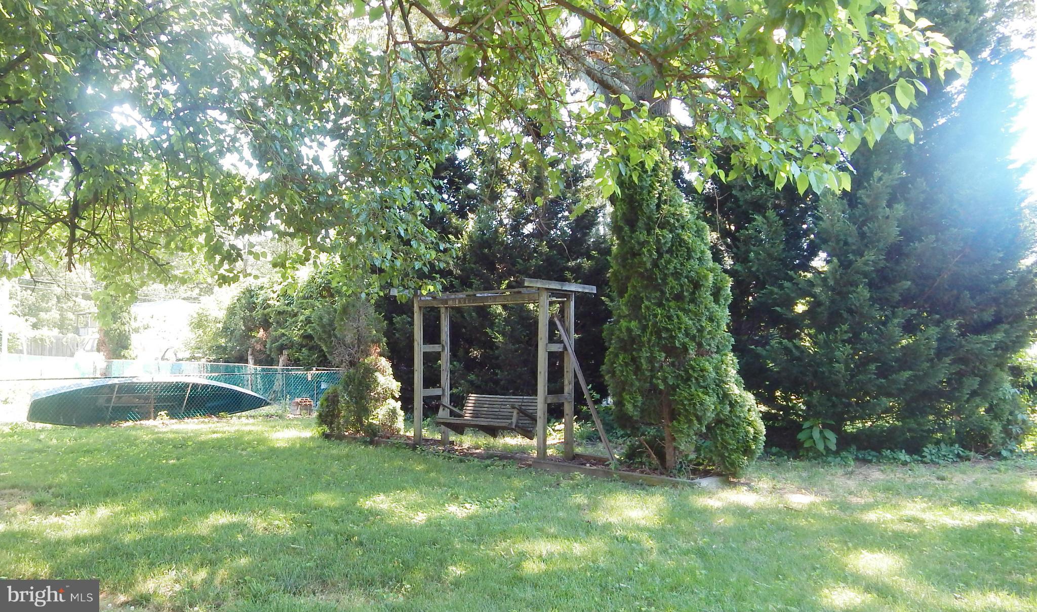 785 Evergreen Road Severn, MD 21144 - Photo 5 of 25 a view of outdoor space with deck and backyard