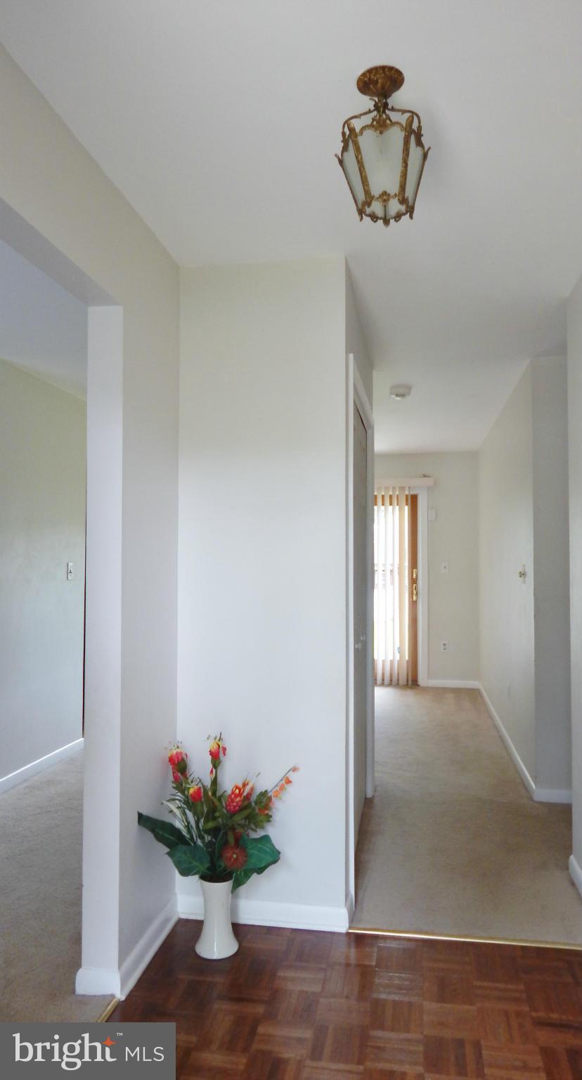785 Evergreen Road Severn, MD 21144 - Photo 8 of 25 a view of a room with a potted plant