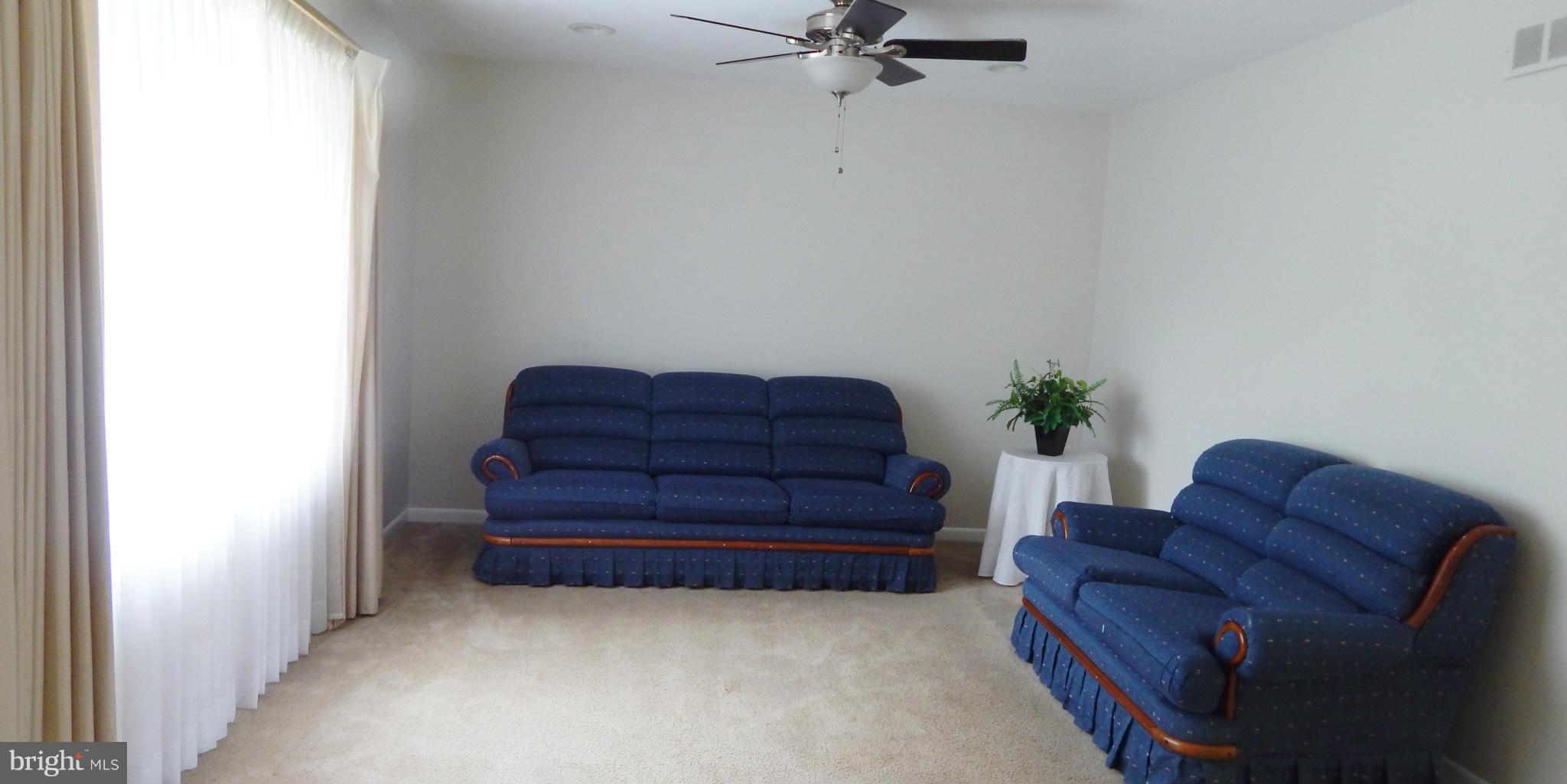 785 Evergreen Road Severn, MD 21144 - Photo 9 of 25 a living room with furniture