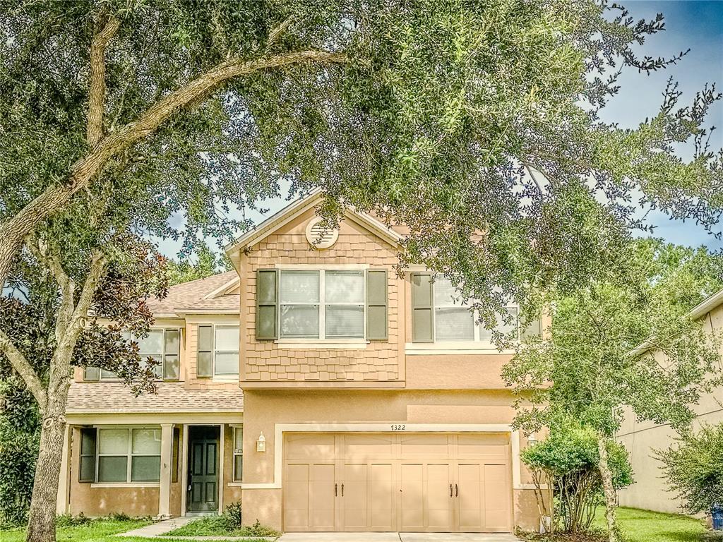 7322 Bridgeview Drive Wesley Chapel, FL 33545 - Photo 1 of 75 a front view of a house