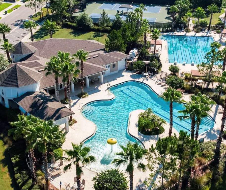 7322 Bridgeview Drive Wesley Chapel, FL 33545 - Photo 67 of 75 an aerial view of a house with outdoor space