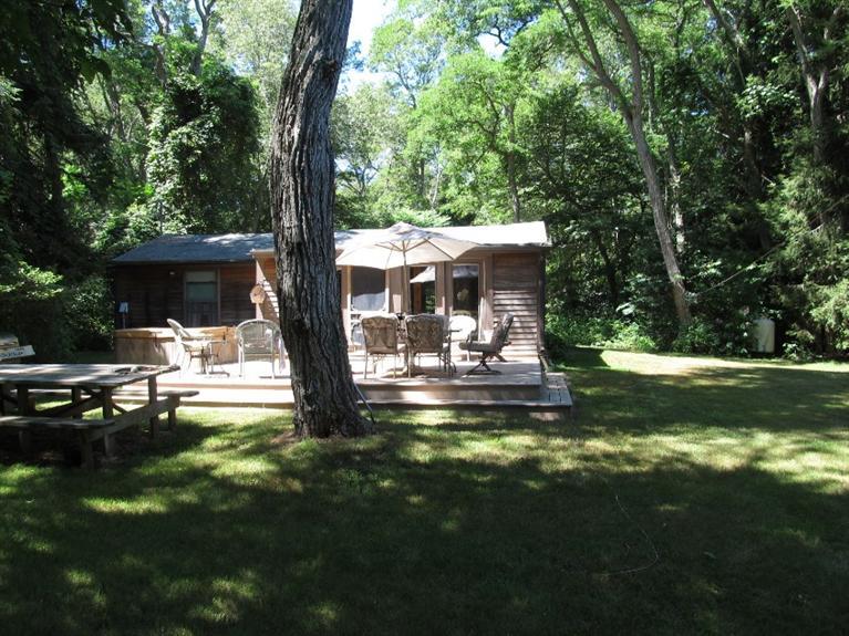 150 Pimlico Pond Road Mashpee, MA 02649 - Photo 25 of 26 a view of a swimming pool with a patio