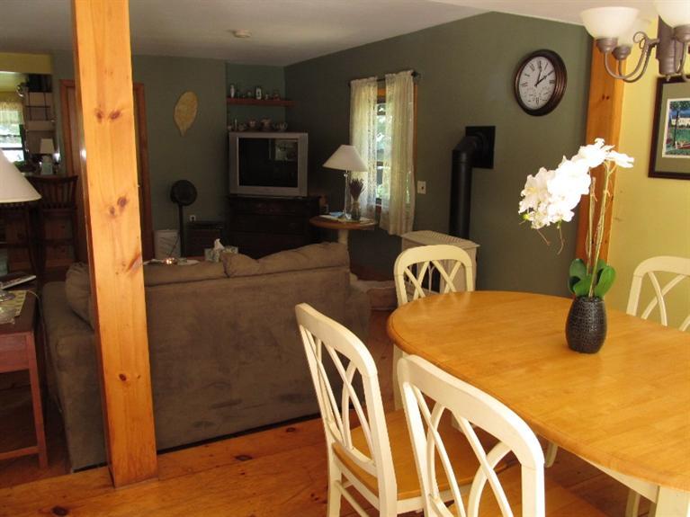 150 Pimlico Pond Road Mashpee, MA 02649 - Photo 5 of 26 a dining room with furniture and mirror