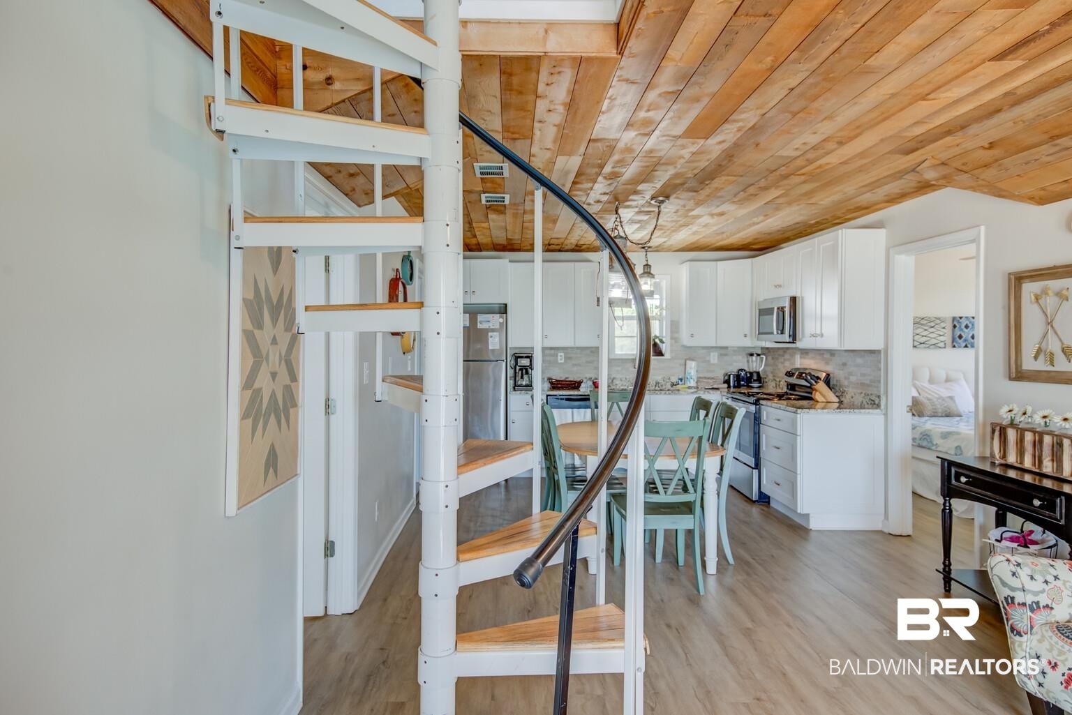 564 Our Road Gulf Shores, AL 36542 - Photo 9 of 44 Spiral stairs to addition