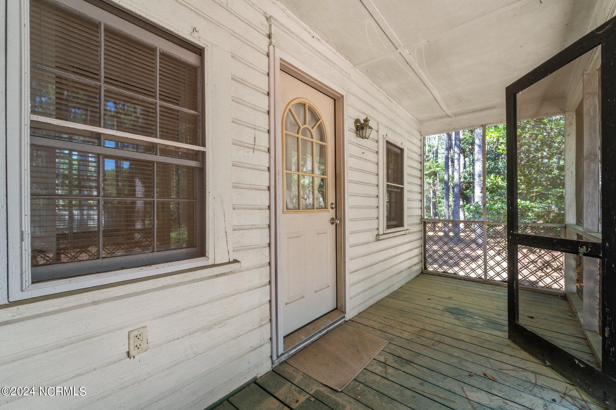 215 Daffodil Road Southern Pines, NC 28387 - Photo 58 of 65 Screened porch guest house