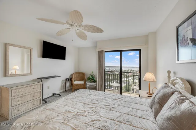 a view of a balcony with a floor to ceiling window
