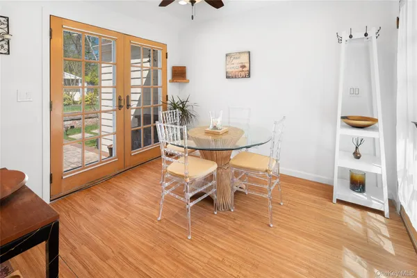 a view of a livingroom with furniture and wooden floor