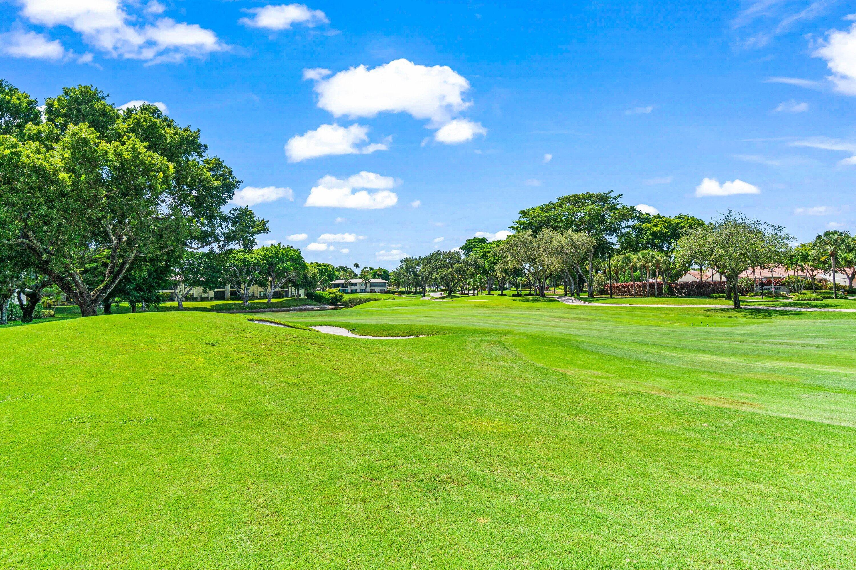 18 Stratford Drive, Unit E Boynton Beach, FL 33436 - Photo 25 of 49 a view of a golf course