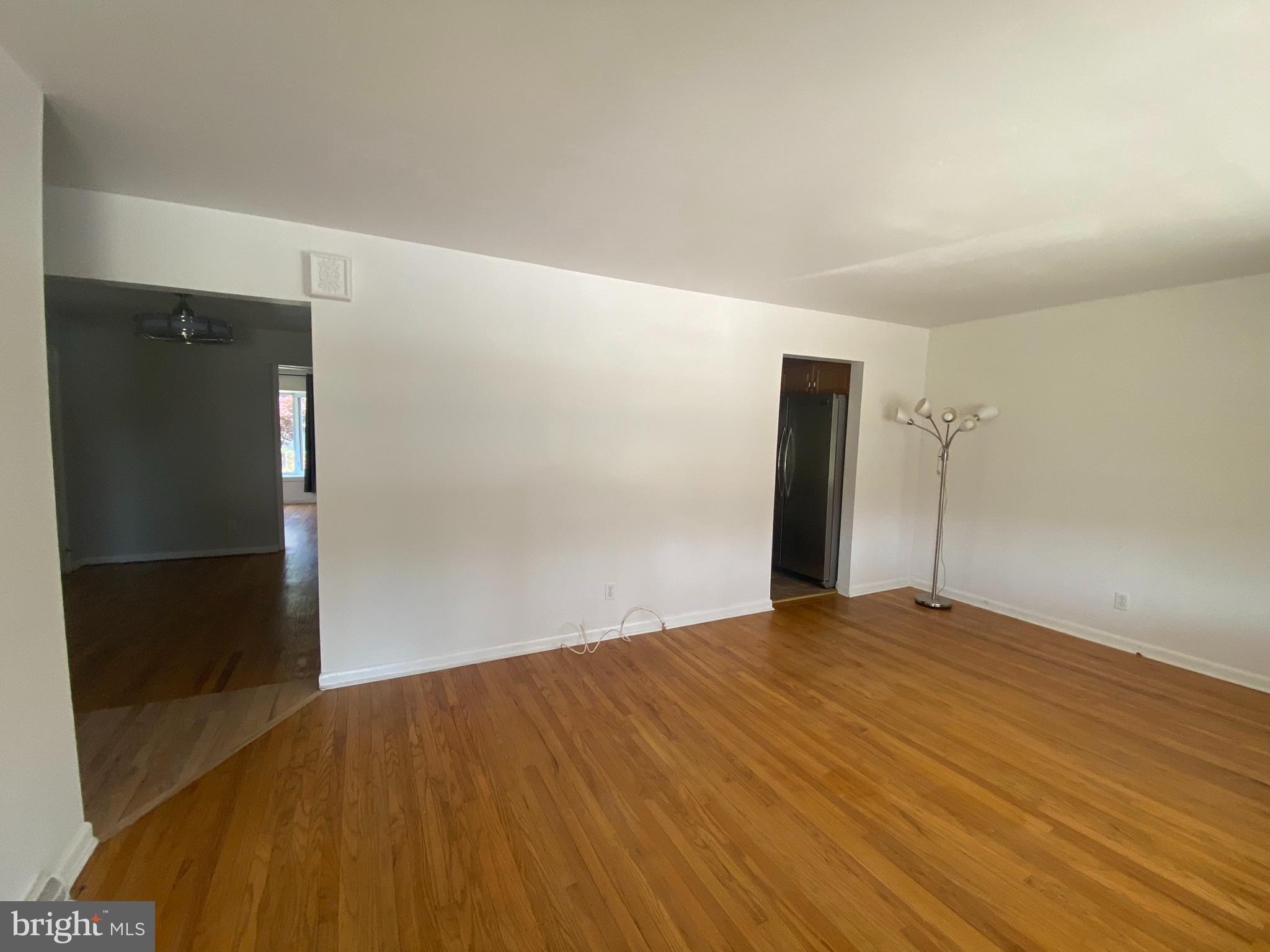 28 Fairmount Drive Glassboro, NJ 08028 - Photo 2 of 24 a view of an empty room with wooden floor