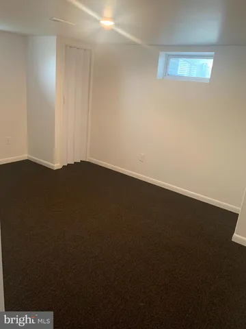 a view of small space with wooden floor