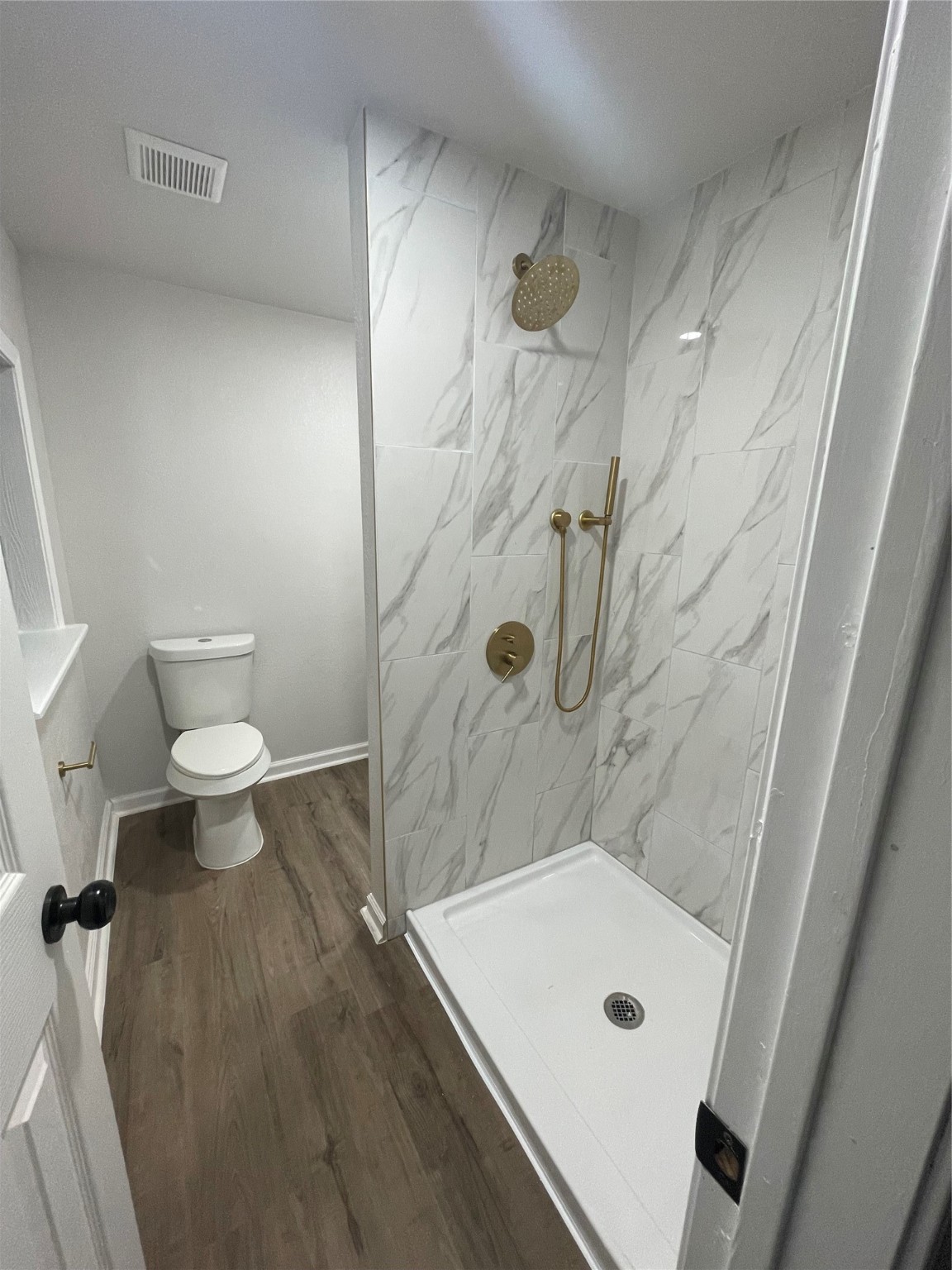 6003 Westover Street Houston, TX 77033 - Photo 17 of 19 a bathroom with a sink a toilet and shower
