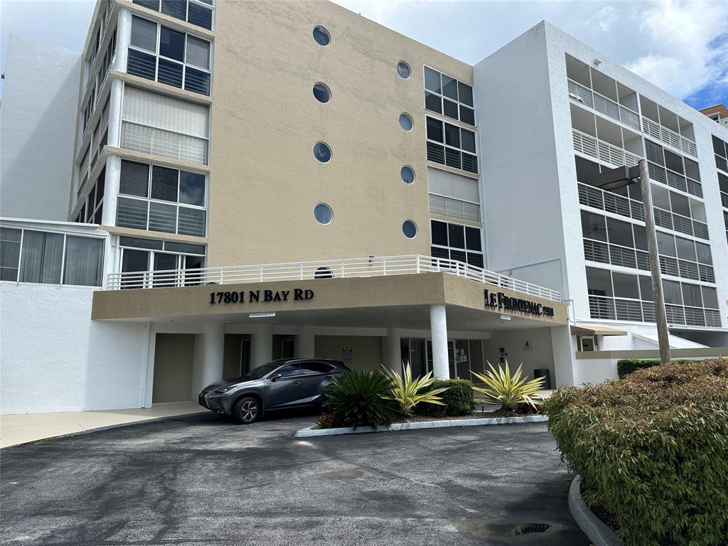 17801 North Bay Road, Unit 212 Sunny Isles Beach, FL 33160 - Photo 42 of 48 a view of a building with a parking space