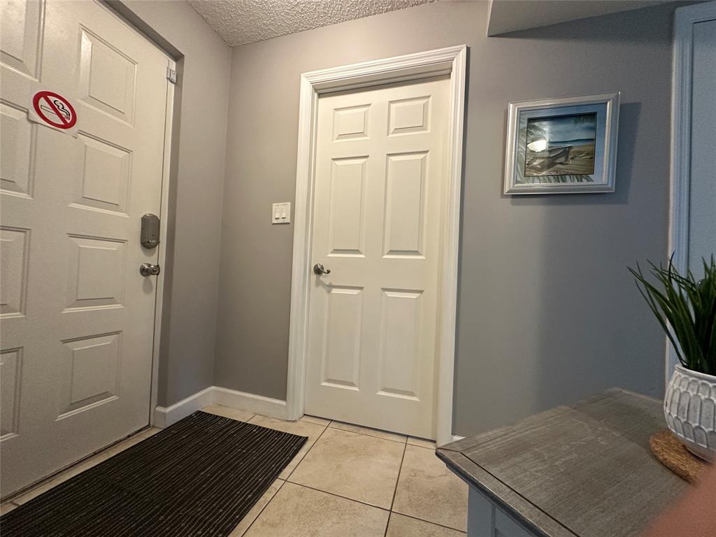 17801 North Bay Road, Unit 212 Sunny Isles Beach, FL 33160 - Photo 45 of 48 a view of kitchen with furniture and wooden floor