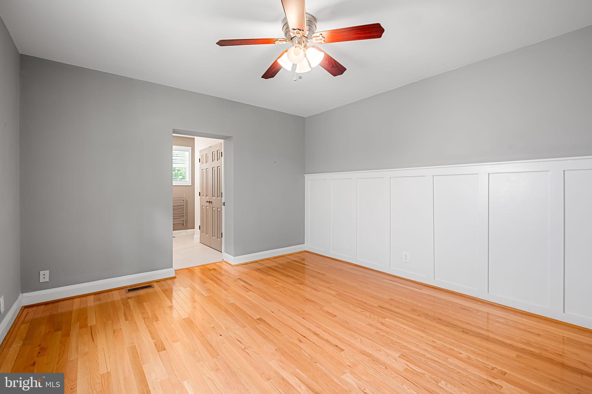 526 Dunkirk Road Baltimore, MD 21212 - Photo 24 of 44 a view of empty room with window and ceiling fan