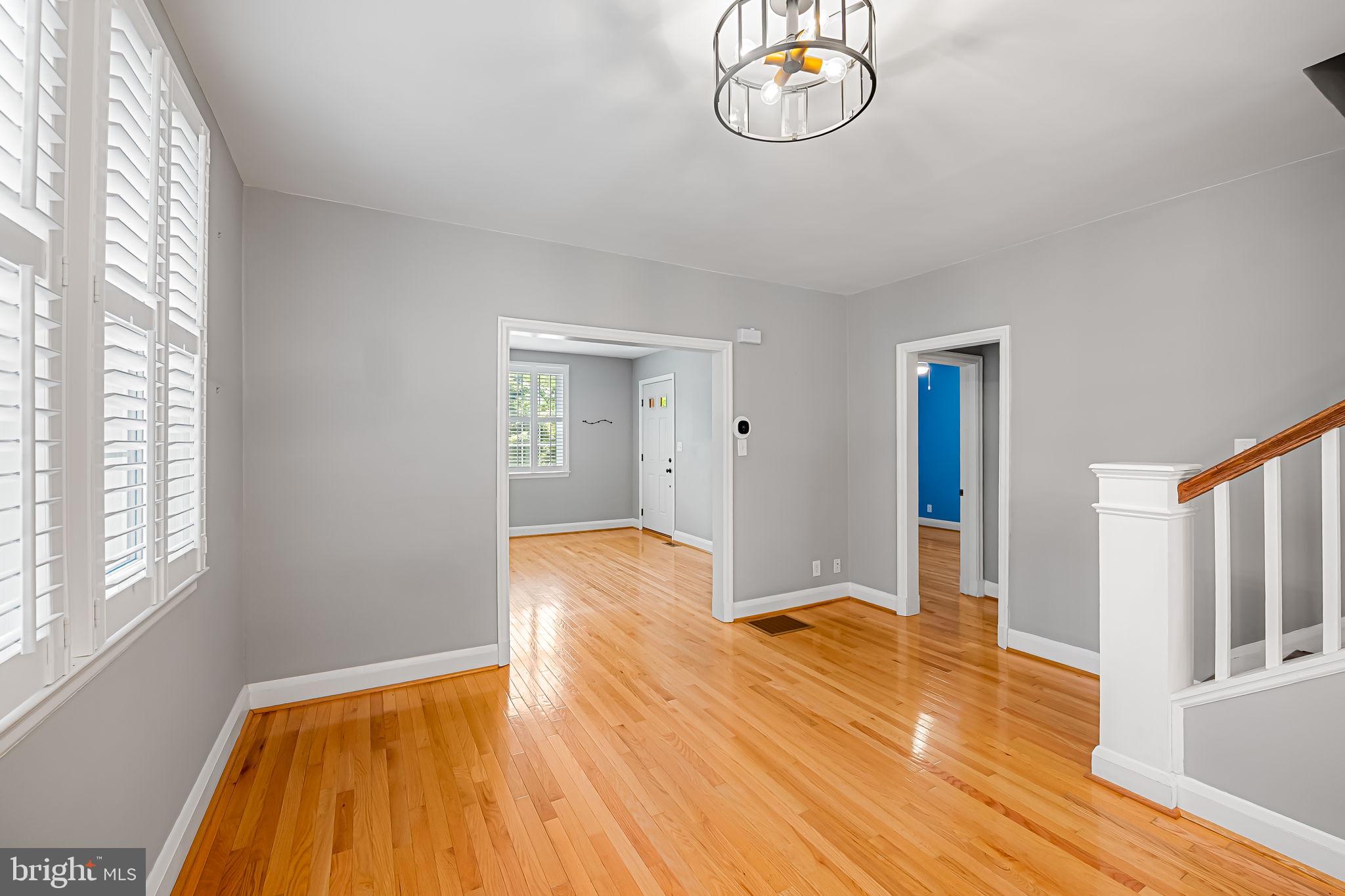 526 Dunkirk Road Baltimore, MD 21212 - Photo 10 of 44 a view of empty room with wooden floor