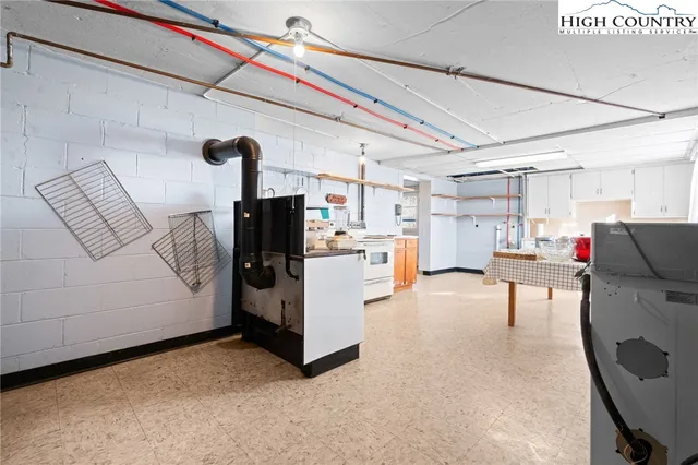 a view of storage and utility room with washer and dryer