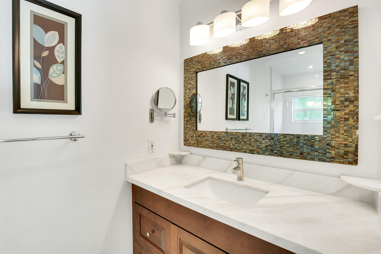 1031 Northwest 6th Street Boca Raton, FL 33486 - Photo 12 of 20 a bathroom with a sink and a mirror