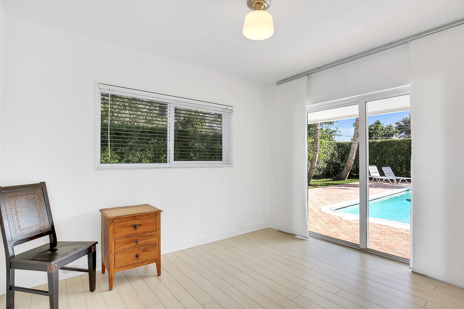 1031 Northwest 6th Street Boca Raton, FL 33486 - Photo 17 of 20 a view of a livingroom with furniture and a window