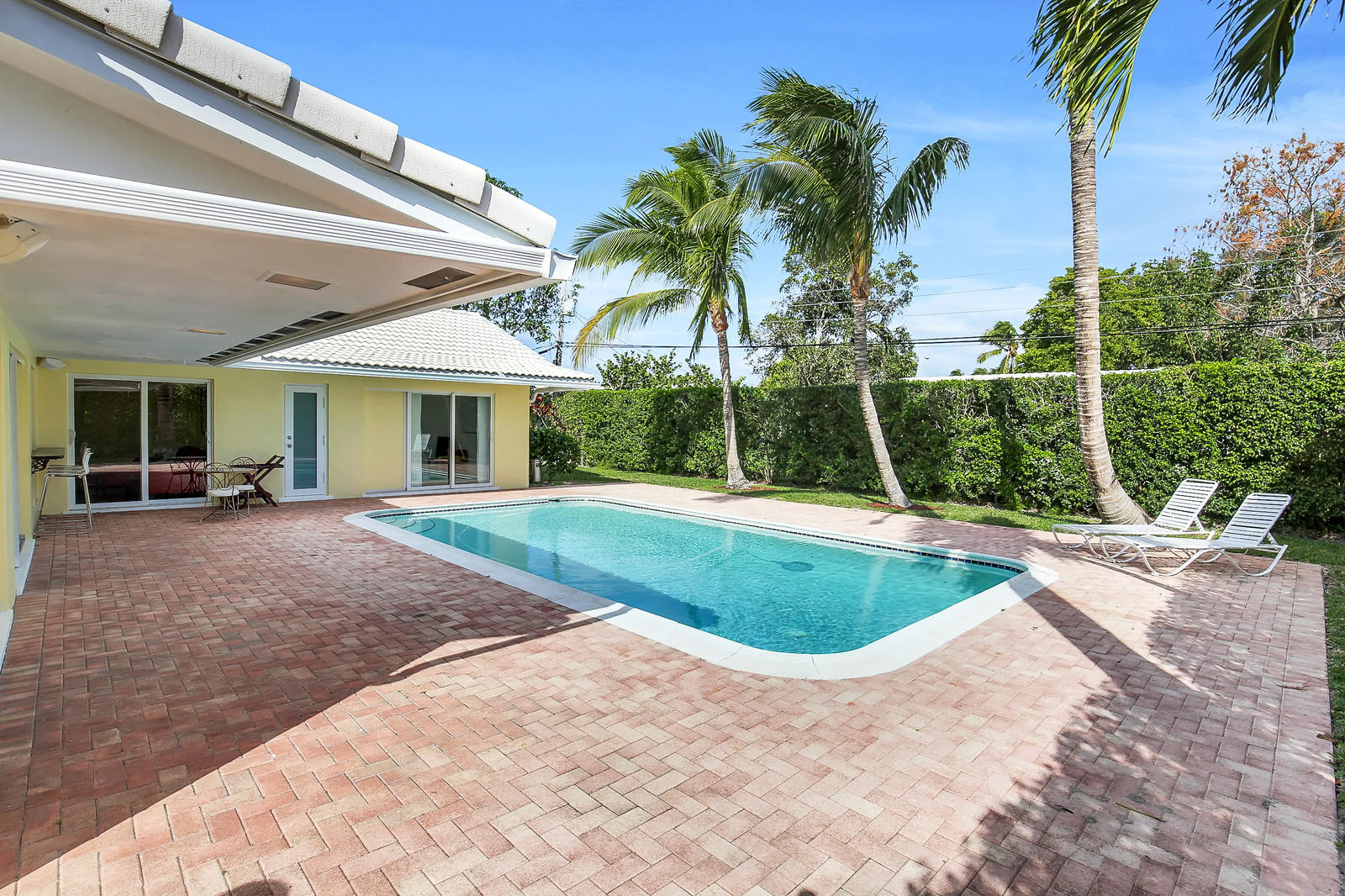 1031 Northwest 6th Street Boca Raton, FL 33486 - Photo 19 of 20 a view of outdoor space yard and swimming pool