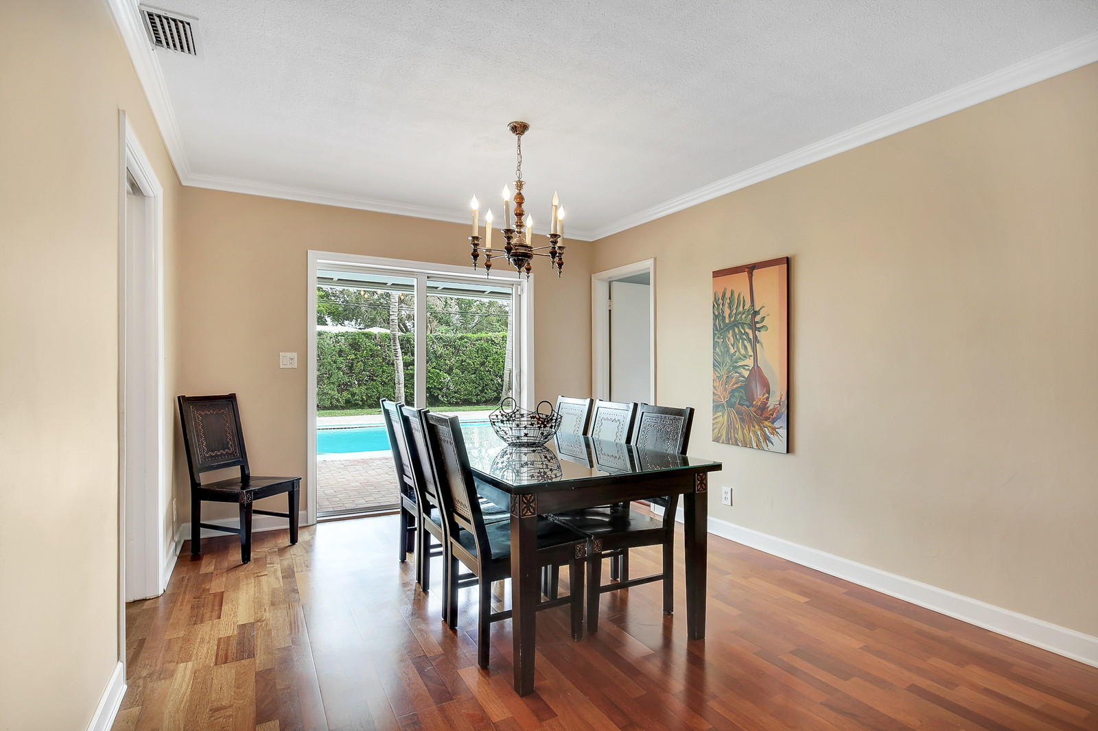 1031 Northwest 6th Street Boca Raton, FL 33486 - Photo 4 of 20 a view of a dining room with furniture window and wooden floor