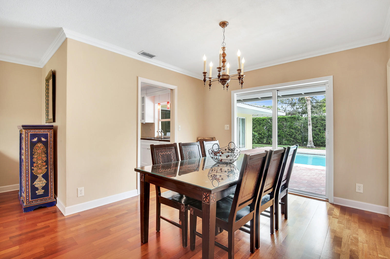 1031 Northwest 6th Street Boca Raton, FL 33486 - Photo 5 of 20 a view of a dining room with furniture window and wooden floor