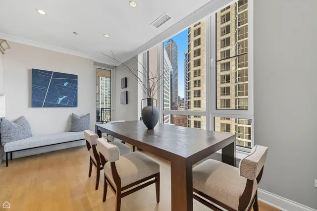a view of a balcony with chairs