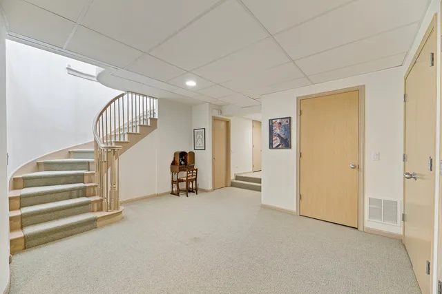 a room with furniture and white walls