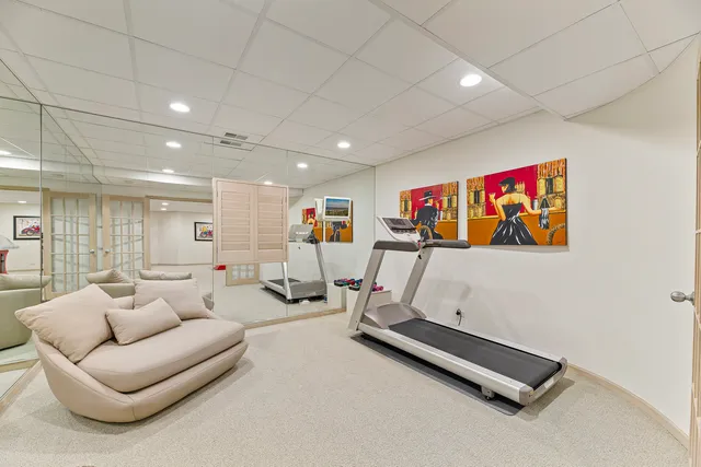 a swimming pool with outdoor seating